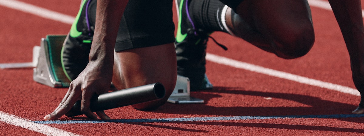 现代体育赛事直播技术控制中心大屏幕显示多场比赛画面